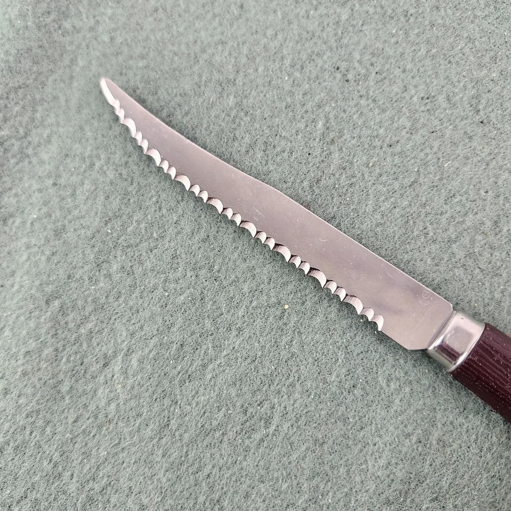 Vintage QUIKUT Serrated Steak Knives Plastic Faux Wood 4